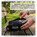 Person opening a black Breezy Packs cooler bag on a wooden bench with a park background. 